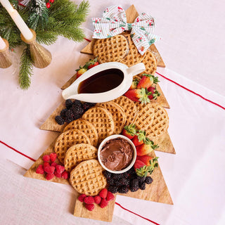 Wooden Christmas tree board with magnetic feature and waffles

Tree-shaped serving board with holiday bows and breakfast spread

Wooden tree board for entertaining with fruit and syrup display

Holiday serving board in tree shape with magnetic bow accents

Festive wood tree board perfect for Christmas brunch or parties