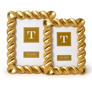 Set of two gold leaf twist photo frames in 4x6 and 5x7

Elegant spiral gold photo frames with glossy finish

Handcrafted gold resin twist frames for home décor

Gold swirl photo frame set for table or shelf display