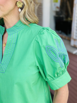 Green Callie top with puff sleeves and embroidered notched neckline