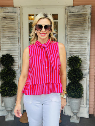 Ella striped sleeveless peplum top with tie neck detail in pink and red stripes