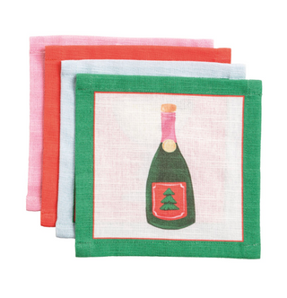 Set of four cotton holiday cocktail napkins featuring festive Christmas drink illustrations including champagne, martini, cocoa, and dessert cocktails.