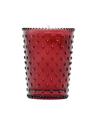 Cranberry Votive Hobnail Glass Candle in red glass jar

Red soy wax candle with cranberry and plum fragrance

Hand-poured Cranberry votive candle in hobnail glass

Festive cranberry-scented candle with vanilla and jasmine notes

3.5 oz Cranberry Votive Hobnail Candle with textured red glass
