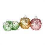 Metallic glass candle jars in pink, green, and yellow with jeweled tops

Set of decorative metallic glass candles in assorted colors and scents

Luxury holiday candles in metallic glass holders – pink blackberry peach, green sparkling citrus, yellow sweet currant

Colorful metallic glass candles with cutout design for glowing effect