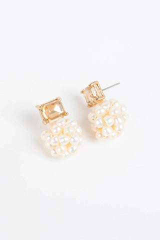 Gold-plated post earrings with rectangular crystal top and cluster of faux pearls

Elegant stud earrings featuring freshwater pearl-inspired cluster and crystal accent

Pearl Cluster Post Earrings in blush and white color options

