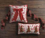 Christmas toile pillow with large red velvet bow and piped edge

Holiday throw pillow with dimensional velvet bow and tartan back

Toile print cotton pillow with festive bow detail

Square Christmas pillow with velvet bow and zipper closure