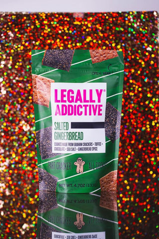 Legally Addictive The O.G. cookies bag with chocolate toffee crackers

Legally Addictive Peppermint Crunch holiday cookies bag with toffee and chocolate

Legally Addictive Surprise Party cookies with sprinkles on colorful packaging

Legally Addictive Everything cookies bag with toffee chocolate and seasoning

Legally Addictive Salted Gingerbread cookies bag with chocolate graham crackers