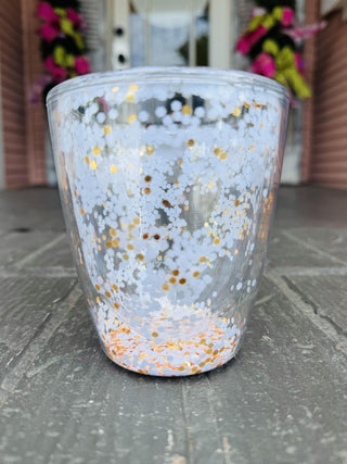 Clear acrylic wine tumbler with floating burnt orange and white glitter