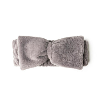 Ultra plush spa headband with bow design for skincare routines

Soft spa headband for washing face and applying makeup

Plush bow headband to keep hair back during skincare

One size fits most spa headband with wide elastic band
