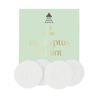 Musee eucalyptus and mint shower steamers with green packaging