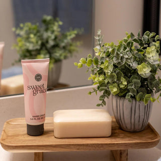 Sweet Grace Hand Cream tube with pink floral design

Bridgewater Sweet Grace shea butter hand cream

Nourishing hand cream with Sweet Grace fragrance

Hand lotion with shea butter and vitamin E