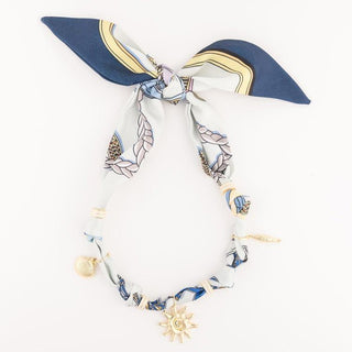 Kaia Scarf Charm Necklace blue and white scarf with gold sun charm