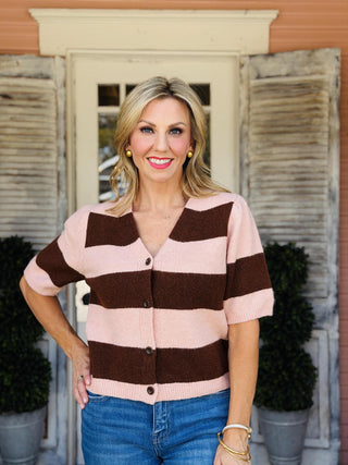 Olivia Top featuring a soft pink and brown striped knit sweater with short sleeves, button-front closure, and a collared neckline.