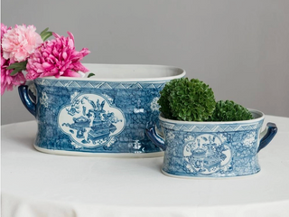 Blue and white ceramic planter set with floral pattern and side handles