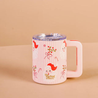 Holly Jolly Santa 14 oz Insulated Mug by The Darling Effect

Pink holiday mug with vintage Santa and candy cane print

The Darling Effect insulated Santa mug with handle and lid

Festive pink stainless steel insulated mug with Santa design
