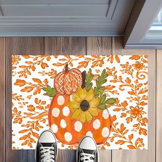 Orange Chinoiserie Harvest Pumpkin Rug Floormat featuring a polka dot pumpkin, sunflower, and orange floral chinoiserie pattern on a 20" x 32" non-slip rug.