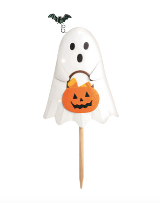Halloween LED yard stakes featuring a skeleton tombstone, Hocus Pocus cauldron, and ghost carrying a jack-o'-lantern bucket on wooden stakes.