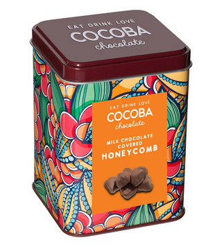 Cocoba milk chocolate covered honeycomb in colorful gift tin

Milk chocolate honeycomb tin by Cocoba Chocolate

Cocoba honeycomb candy in decorative reusable tin

Chocolate covered honeycomb pieces in vibrant gift tin