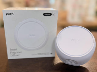Pura Device V5 smart home fragrance diffuser with dual scent holder and app controls in white