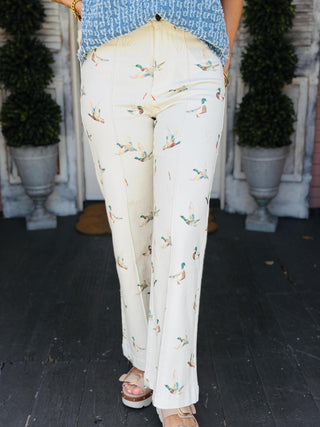 Mallard print stretch denim wide leg jeans with cropped length, front seam detail, and high-rise fit.