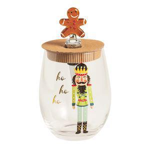 Stemless nutcracker wine glass with gingerbread stopper

Christmas wine glass with ho ho ho text and nutcracker design

Holiday wine glass gift set with cork and gingerbread bottle stopper

Festive wine glass and metal stopper with gingerbread man topper


