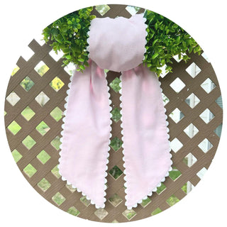 Decorative wreath sash with gingham fabric and scalloped trim close up