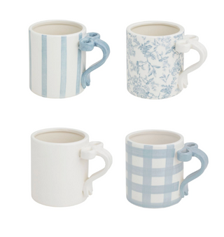 Decorative ceramic mug with 3D bow handle