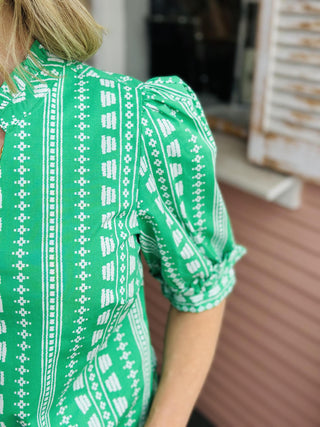 Colette Green Top with white geometric stripe pattern