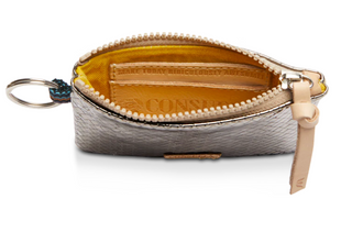 Consuela Kyle Pouch with gunmetal textured exterior and natural leather zipper pull

Gunmetal Consuela Kyle zip pouch with attached keyring and leather logo patch

Consuela Kyle Pouch interior view showing open compartment and credit card slots

Small metallic gray Consuela pouch with zipper closure and keyring