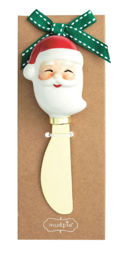 Whimsy Christmas Spreaders featuring brass-plated stainless steel blades with hand-painted holiday handles in Santa, reindeer, candy canes, and Christmas tree designs.