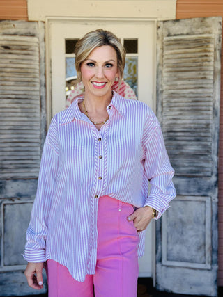 Paislee Top pink striped long sleeve button-down shirt

Pink and white striped collared button-down top for women

Lightweight striped woven button-up blouse

Women’s long sleeve striped shirt with button front