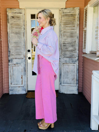 Paislee Top pink striped long sleeve button-down shirt

Pink and white striped collared button-down top for women

Lightweight striped woven button-up blouse

Women’s long sleeve striped shirt with button front