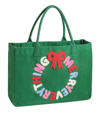 Holiday Bouclé Totes featuring festive canvas designs with bouclé yarn sentiments including "Merry," "Fa La La," and "Merry Christmas" wreath.
