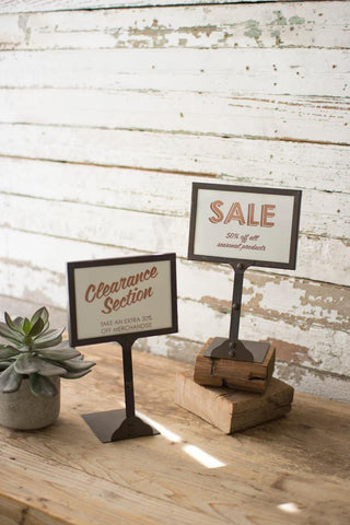 “Metal sign display stand for pricing cards, table numbers, or event signage”
