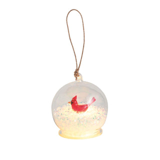 Glass light-up ball ornament with Christmas tree inside

Light-up glass ornament featuring cardinal figurine and snow effect

Santa Claus light-up ball ornament with twine hanger