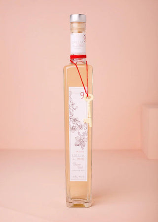 Lollia In Love Classic Petal Dry Body Oil in glass bottle with floral box packaging