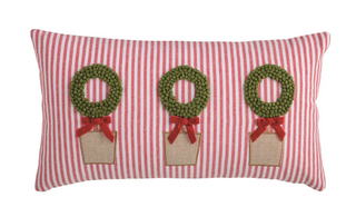 Red striped lumbar pillow with three embroidered green topiary trees featuring French knot embroidery, velvet red bows, and chambray backing.