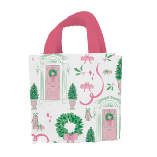 Pink and green Christmas tote bag with festive door and wreath print

Small holiday carry tote featuring wreaths, gifts, and trees

Home for Christmas petite tote with pink handles

Festive pink and green holiday tote bag for gifts and errands

Christmas-themed small tote with illustrated doors and holly
