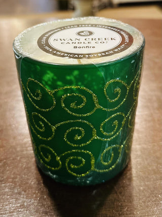 Swan Creek Shimmering Light Large Vase candles in assorted colors

Large soy wax candles in glitter swirl glass jars

Swan Creek 10 oz Shimmering Light candles with decorative glass design

Festive glass candles in red, green, yellow, and white hues

Colorful soy candles in elegant embossed vases by Swan Creek