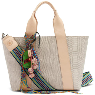 “Consuela Thunderbird Carryall with textured exterior and woven strap”

“Thunderbird Consuela tote bag with natural leather handles and trim”

“Consuela Thunderbird Carryall interior view with pockets and snap closure”

“Large Consuela Thunderbird tote with detachable woven crossbody strap”

“Consuela Thunderbird Carryall made in Mexico with embossed leather texture”