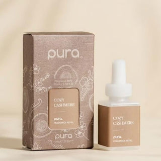 Pura Smart Fragrance Vial in Cozy Cashmere featuring creamy coconut, vanilla bean, apple, jasmine, and sandalwood notes.