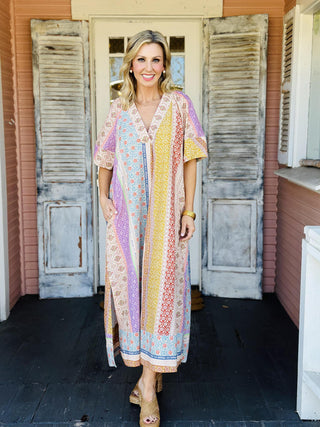 Patchwork print kaftan dress with deep V neckline and short sleeves

Colorful patchwork maxi dress with relaxed kaftan silhouette

Boho patchwork V-neck maxi dress with pockets

Printed kaftan style dress with deep V neckline

Multicolor patchwork maxi dress with flowy fit