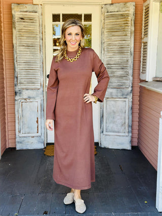 Brown mock neck long sleeve midi dress

Solid knit midi dress in warm brown tone

Eleanor Dress with mock neckline and straight silhouette