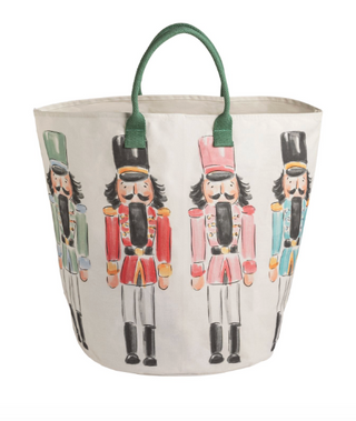 Large Christmas tote bags featuring whimsical holiday prints, including classic nutcrackers and festive Christmas icons with sturdy carry handles.
