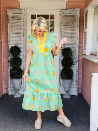 Green Bree Dress with floral and botanical print and ruffled cap sleeves