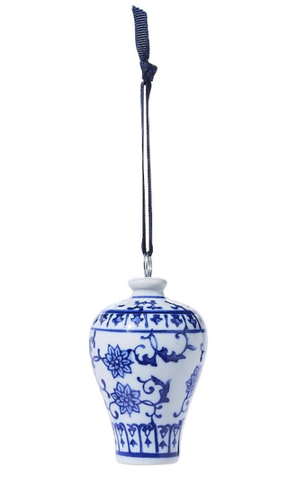 Blue and white porcelain temple jar ornaments with navy hanging ribbons and chinoiserie floral patterns.