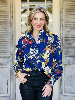 Elowyn Top with navy floral print and ruffle mock neck

Navy blue floral long sleeve blouse with ruffle collar

Elowyn Top floral blouse with smocked cuffs and high neckline

Romantic navy floral top with soft ruffle details

Lightweight floral blouse with mock neck and gathered sleeves