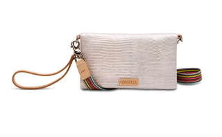 Consuela Celeste Uptown Crossbody with silver reptile-inspired exterior and woven strap

Interior view of Consuela Celeste Uptown Crossbody with card slots and zip compartments

Consuela Celeste crossbody purse with wristlet strap and silver textured finish

Back zipper pocket and magnetic closure on Consuela Celeste Uptown Crossbody bag