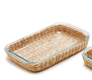 Borosilicate glass baking dish with woven natural basket for oven-to-table serving.
