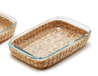 Borosilicate glass baking dish with woven natural basket for oven-to-table serving.