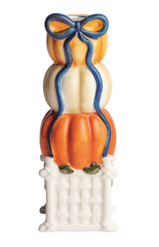 Hand-painted Pumpkin Topiary Taper Holders featuring stacked pumpkins with a blue bow on a white lattice base and coordinating pumpkin taper candle holder.